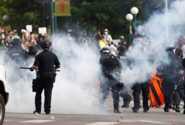 Denver settles protest lawsuits by men injured by police projectiles