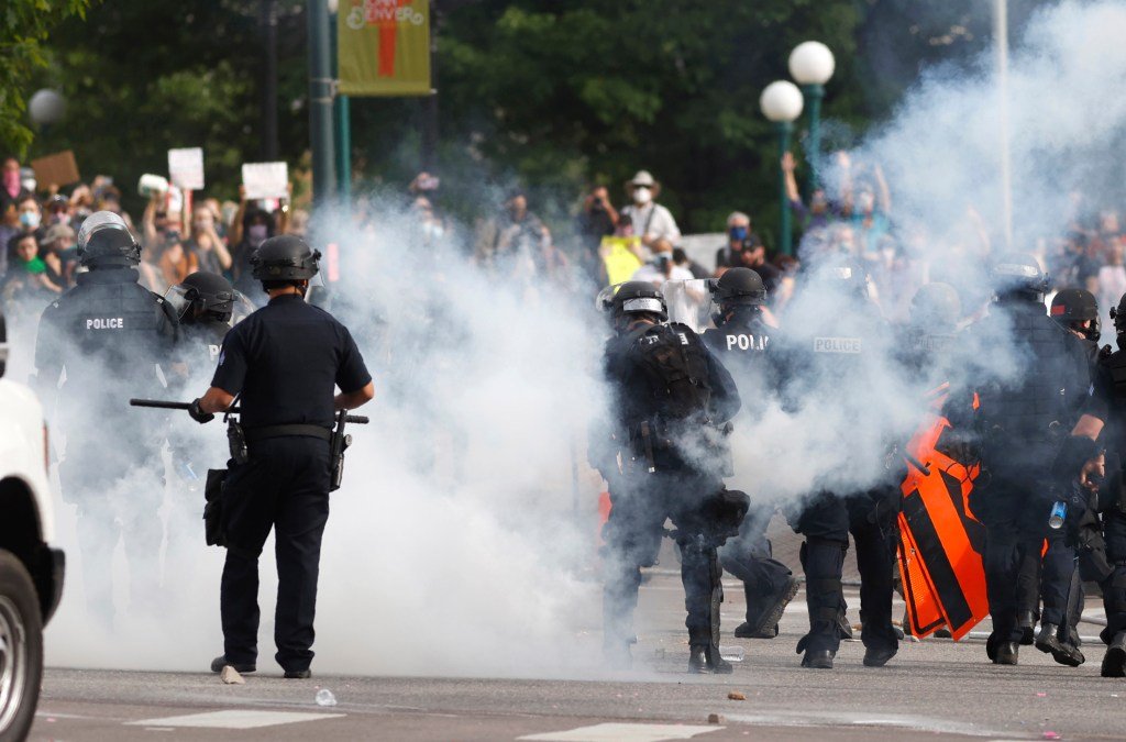 Denver settles protest lawsuits by men injured by police projectiles