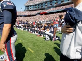 September 24, Protesting NFL players take a knee