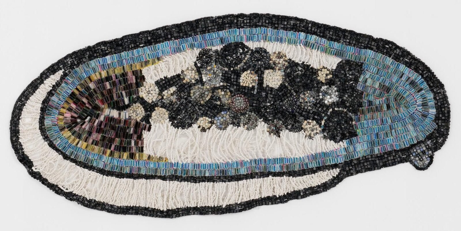 From computer keys and bottle caps, Moffat Takadiwa's tapestries collapse geographies – colossal