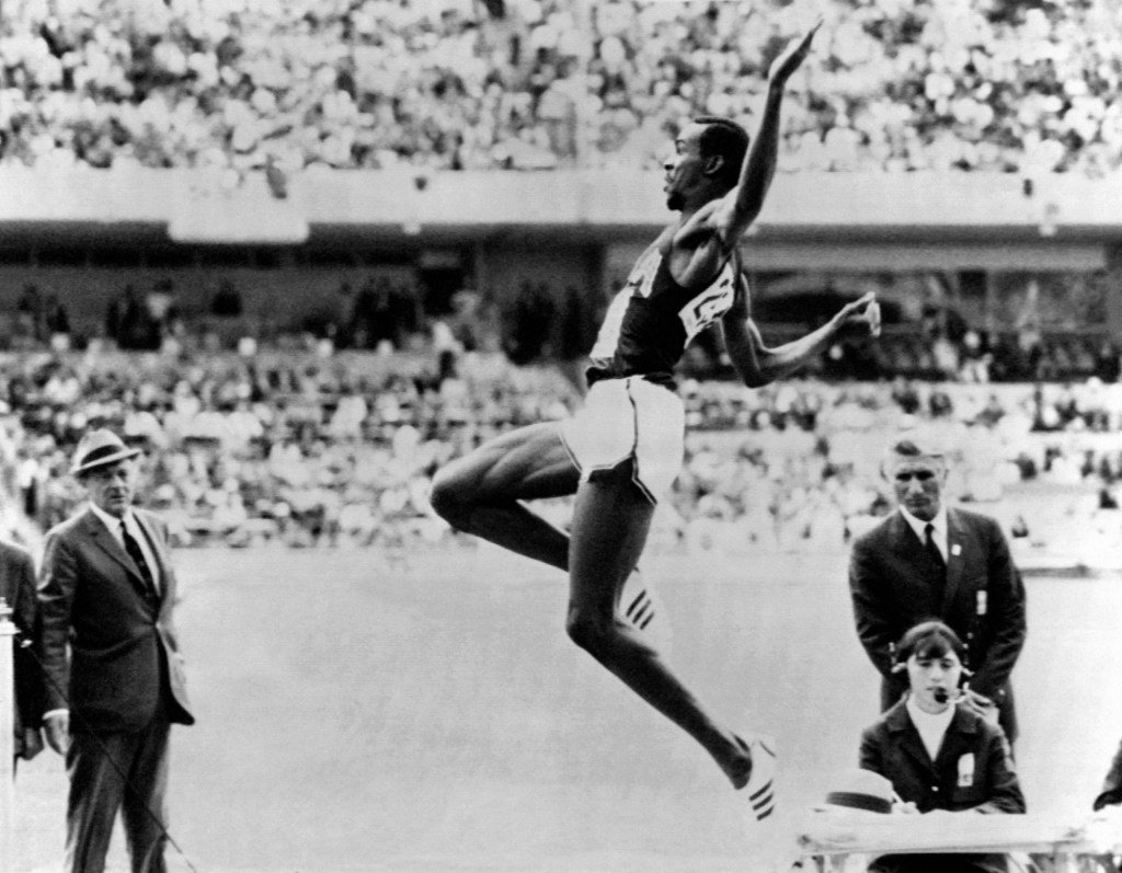 October 18, American shatters long jump world record by nearly two feet