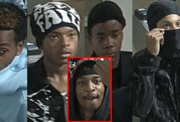 Officers are trying to identify five suspects who robbed a woman at the Red Line station