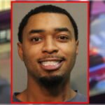 Say cheese! Chicago man charged with murder beams winning smile from police mugshot