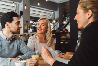 Couple and agent at listing appointment