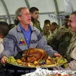 November 27, President George W. Bush spends Thanksgiving with U.S. troops in Iraq