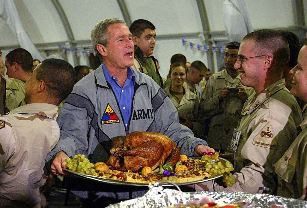 November 27, President George W. Bush spends Thanksgiving with U.S. troops in Iraq