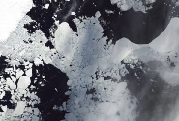 The former Conger ice shelf is shown as a white mass on Earth