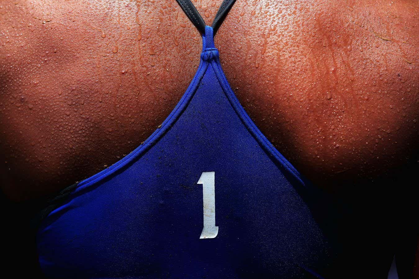 Sweat is seen on the back of Varapatsorn Radarong of Thailand during her Beach Volleyball Women