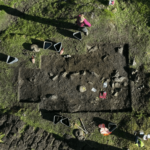 Viking women's graves excavated to find jewellery, coins and a 'filler stone'