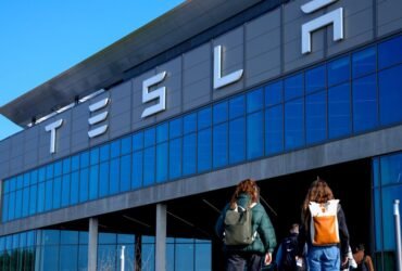 Activist Group Projects ‘Heil’ Message On Berlin Tesla Factory After Elon Musk Salute