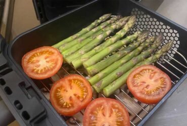 Two layers of vegetables ready to go into the air fryer