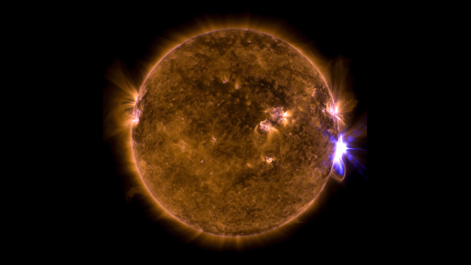 NASA’s Solar Dynamics Observatory captured this image of a solar flare–as seen in the bright flash on the right side–on September 10, 2017. The image shows a combination of wavelengths of extreme ultraviolet light that highlights the extremely hot material in flares, which has then been colorized.