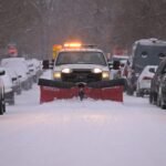 Freeways icy but open after overnight snow