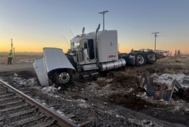 Semitruck driver injured in east Aurora train crash