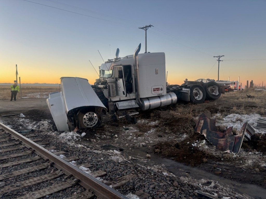 Semitruck driver injured in east Aurora train crash