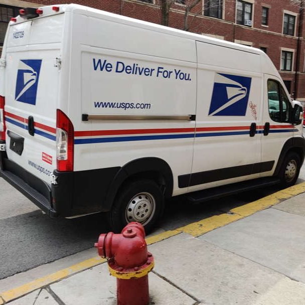 Armed men robbed mail worker, says Chicago police