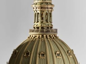 a detail of an intricate cardboard sculpture of an elaborate cathedral dome