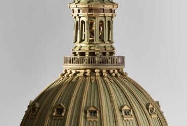 a detail of an intricate cardboard sculpture of an elaborate cathedral dome