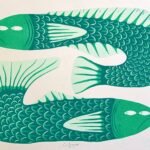 a woodblock print of two green fish facing in different directions