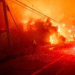 Firefighters battle the Palisades Fire in the Pacific Palisades neighborhood of Los Angeles, California, US, on Tuesday, Jan. 7, 2025.