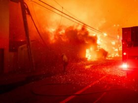 Firefighters battle the Palisades Fire in the Pacific Palisades neighborhood of Los Angeles, California, US, on Tuesday, Jan. 7, 2025.