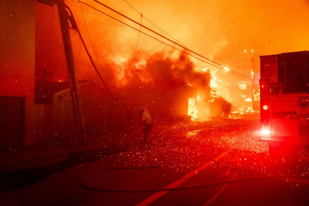 Firefighters battle the Palisades Fire in the Pacific Palisades neighborhood of Los Angeles, California, US, on Tuesday, Jan. 7, 2025.