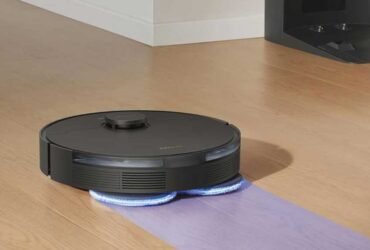 Robot vacuum cleaning a wood floor