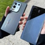 Infinix Solar Concept Phone and Case Being Held in Hand While Charging Outdoors