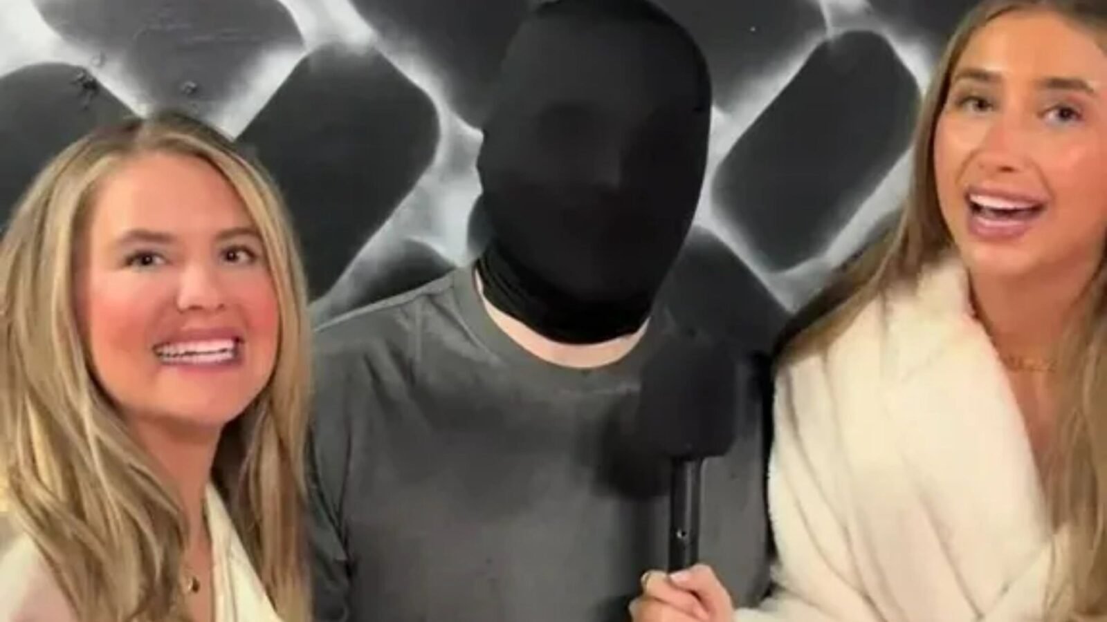 Lily Phillips makes it sick about 'taking the virginity of man' while hiding his face behind Balaclava in new video