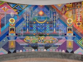 detail of a vibrant geometric mural made of mosaic