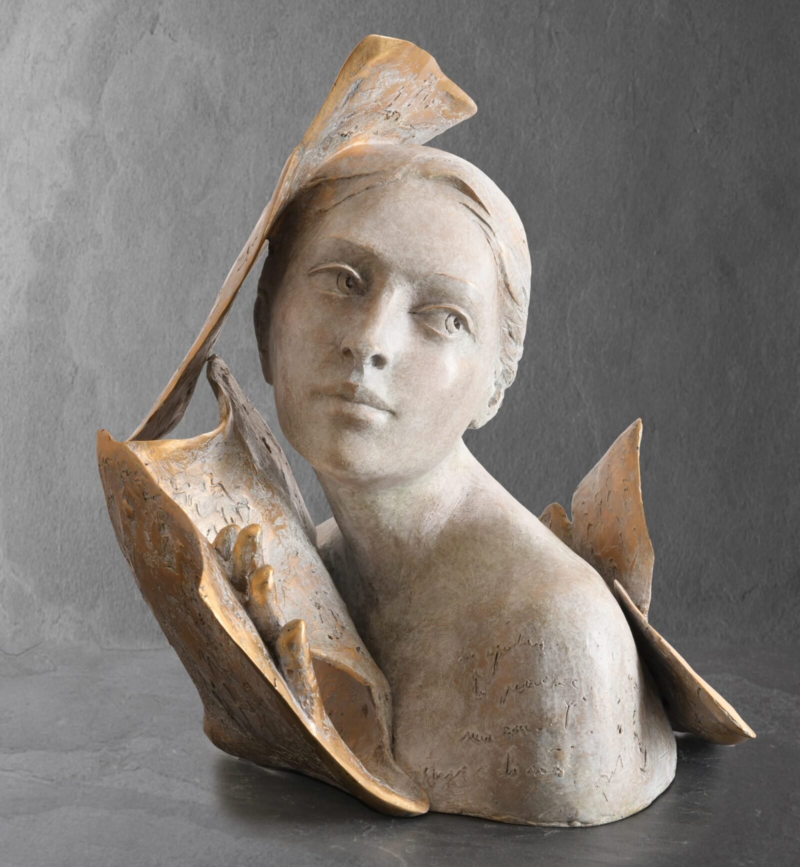 a sculpture of a woman