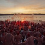 Bare-arsed Aussies brave icy waters for solstice swim