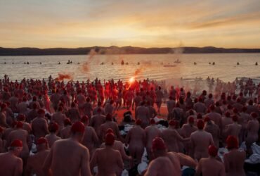 Bare-arsed Aussies brave icy waters for solstice swim