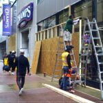 Board-up crews hired, weddings canceled in preparation for Anti-Trump-Rally in the loop