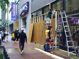 Board-up crews hired, weddings canceled in preparation for Anti-Trump-Rally in the loop