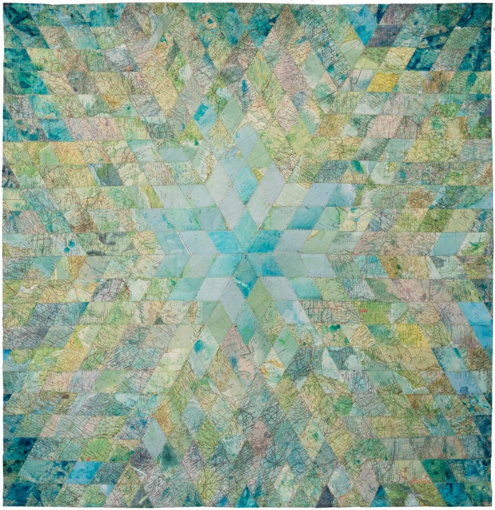 Faith XLVII sewing textiles made of world maps and currency to explore the 'veins of the world' - Kolossal