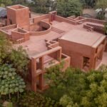 an aerial view of a contemporary brick home