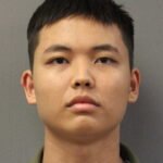 Subway Restaurant Rover Bust with water gun and a note with the text: "I have a gun. This is a robbery."