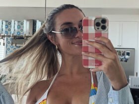 The world's sexiest volleyball star Kayla Simmons sets a busty view in Just Bikini and open shirt