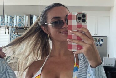 The world's sexiest volleyball star Kayla Simmons sets a busty view in Just Bikini and open shirt