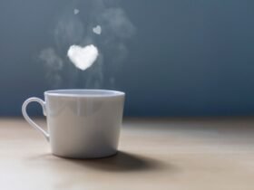 A cup of coffee with a lot of love. Conceptual photography Hearts of smoke come out of a cup of coffee.
